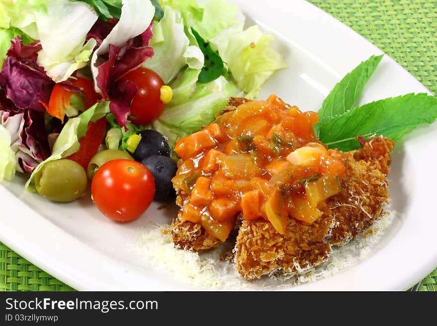 Salad chicken with the sauce from tomatoes in the dish