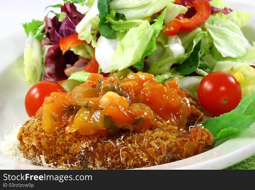 Salad chicken with the sauce from tomatoes in the dish