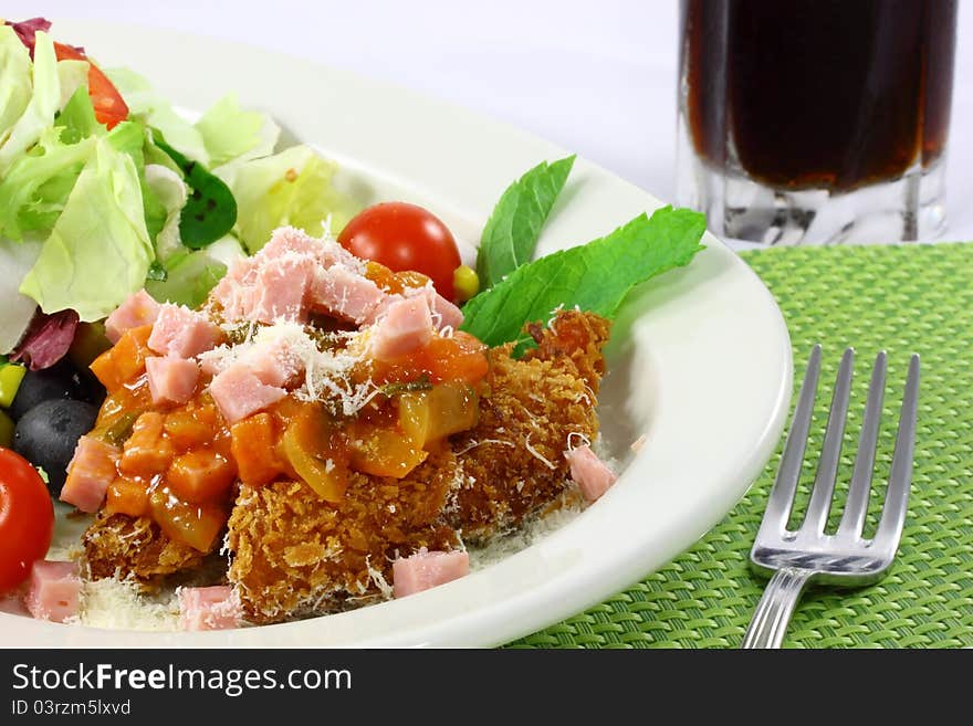 Salad chicken with the sauce from tomatoes in the dish