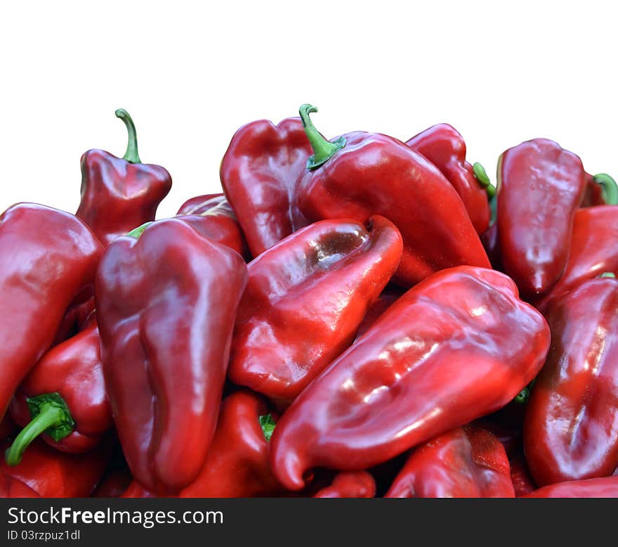 Fresh red peppers with the water drops isolated on white. Fresh red peppers with the water drops isolated on white