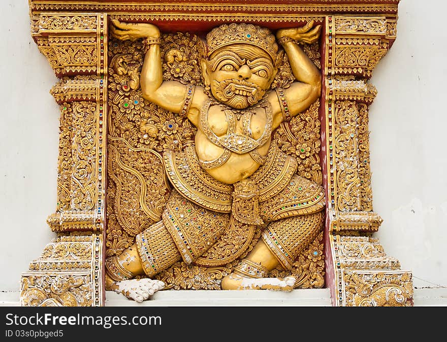 A decorative giant stucco in a temple. A decorative giant stucco in a temple