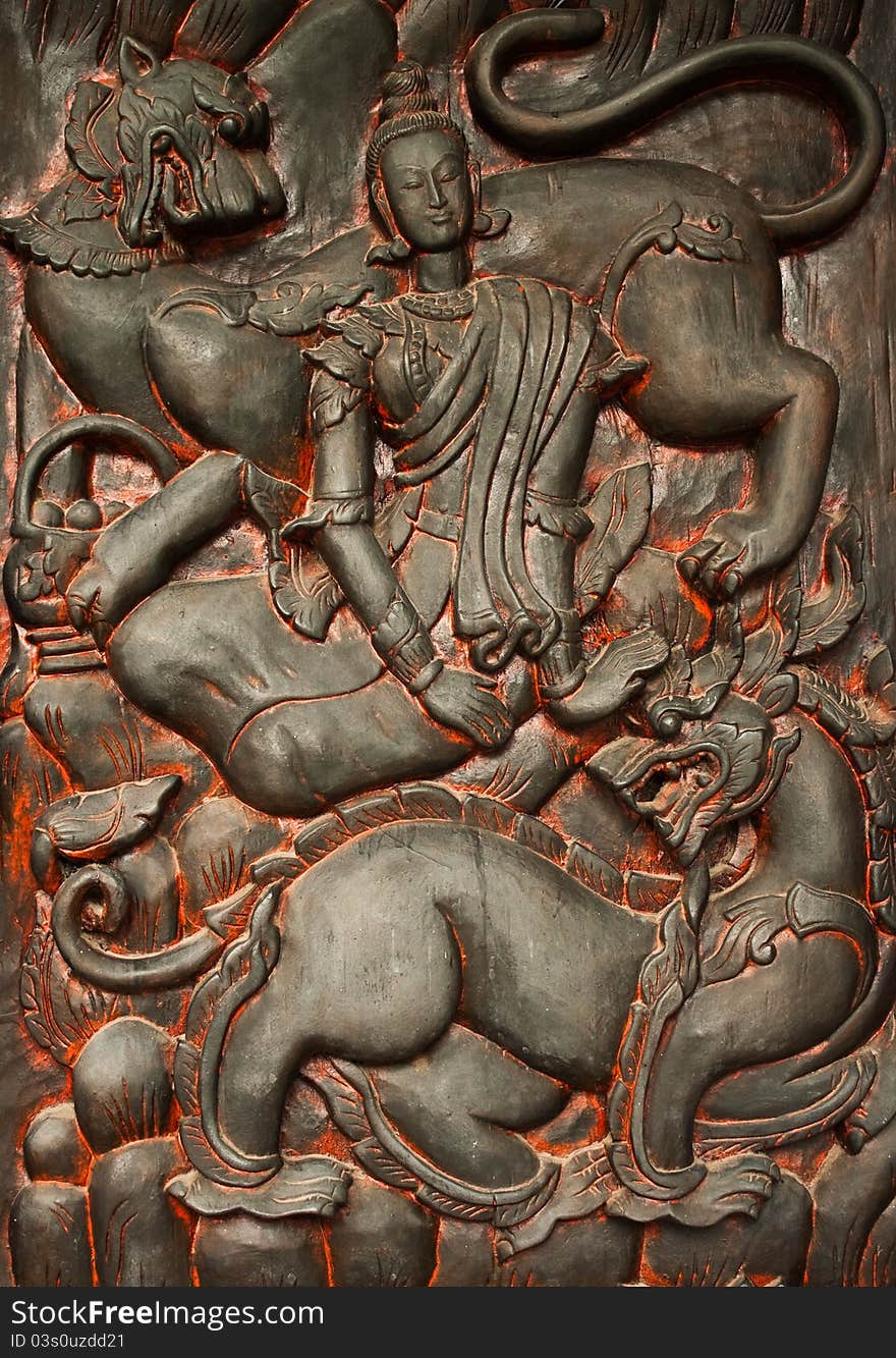 A decorative wood carving in a temple. A decorative wood carving in a temple