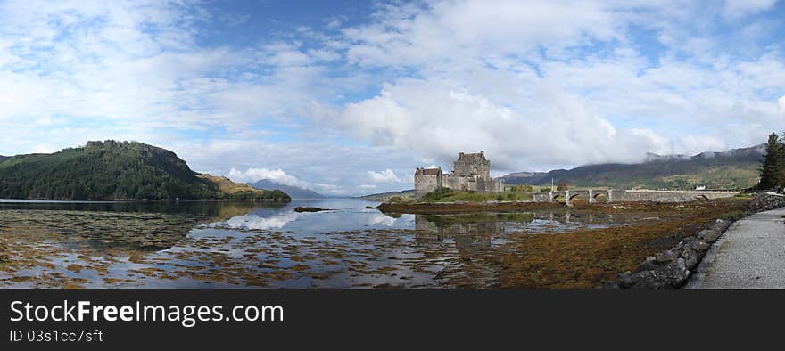 Eilean Donan castle in a sunny day, Scotland Highlands. Eilean Donan castle in a sunny day, Scotland Highlands