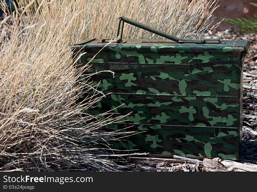 Close-up image of a geocache ammo can hide