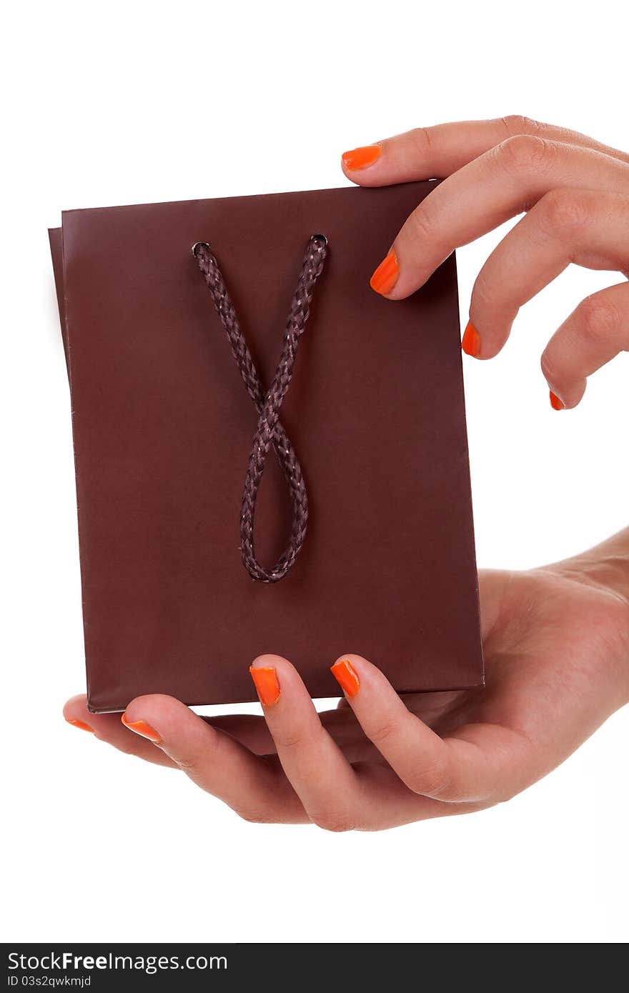 Woman holding beautiful gift, isolated over white