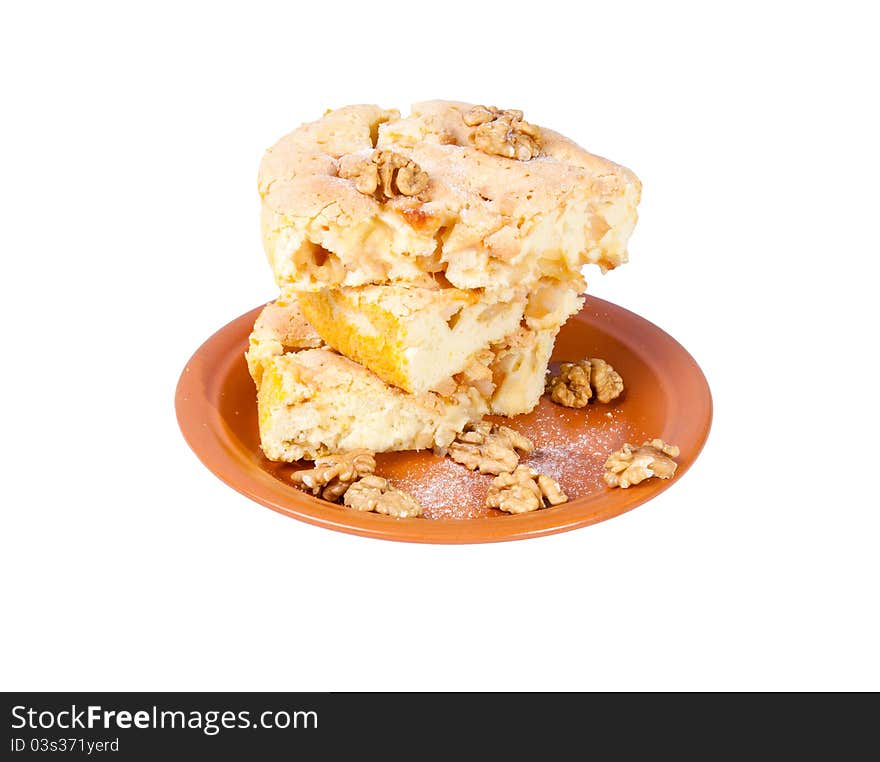 Apple Pie  ( charlotte) with walnuts on white background. Apple Pie  ( charlotte) with walnuts on white background