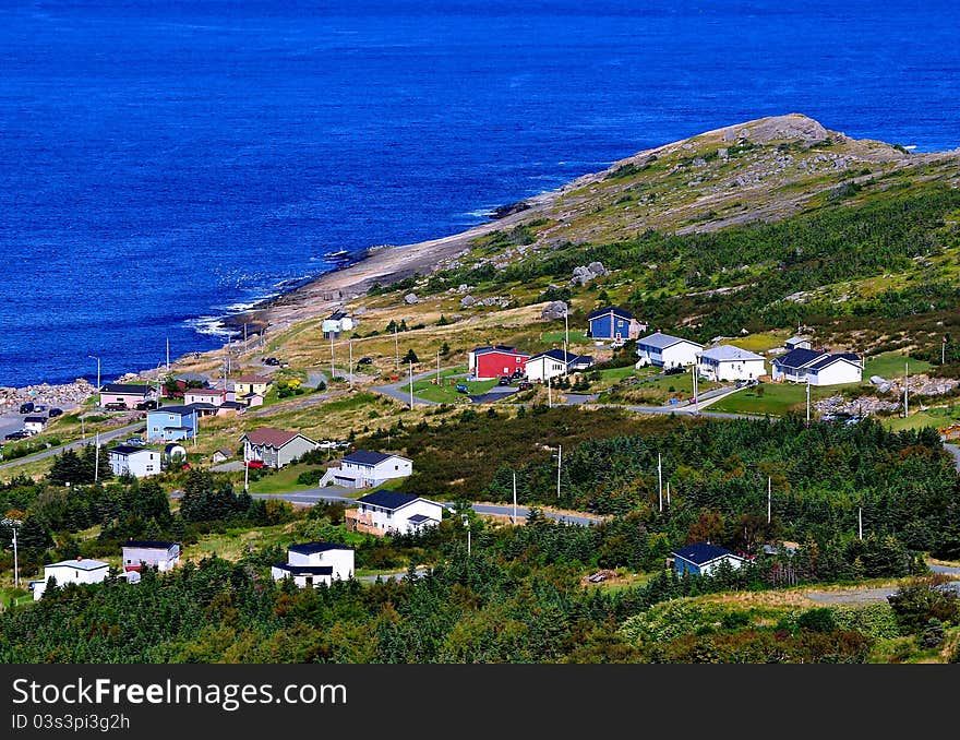 One of many spectacular coastal villages on the Eastern shores of the province of Newfoundland in Canada. One of many spectacular coastal villages on the Eastern shores of the province of Newfoundland in Canada