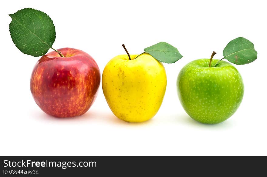 Apples with green leaf on white background