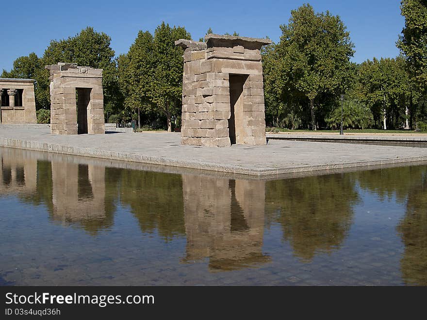 Egyptian temple in Madrid is reflected in the surrounding transparent water. Egyptian temple in Madrid is reflected in the surrounding transparent water