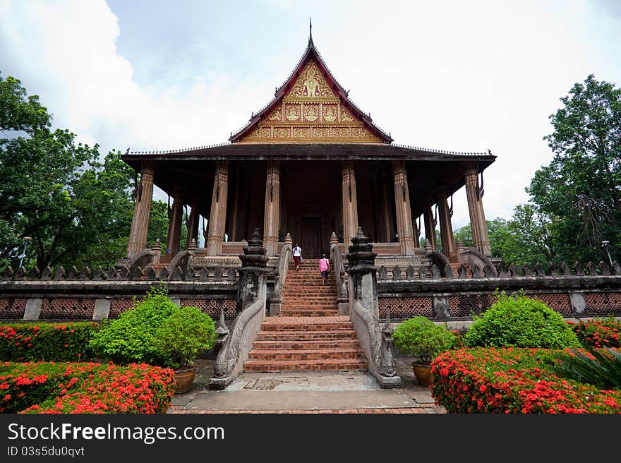 Buddhist temple with blue sky in Laos