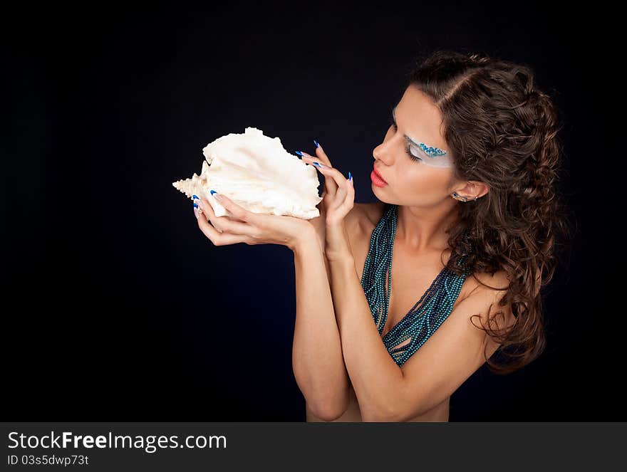 Beautiful woman with carly dark hair and long acrylic nails