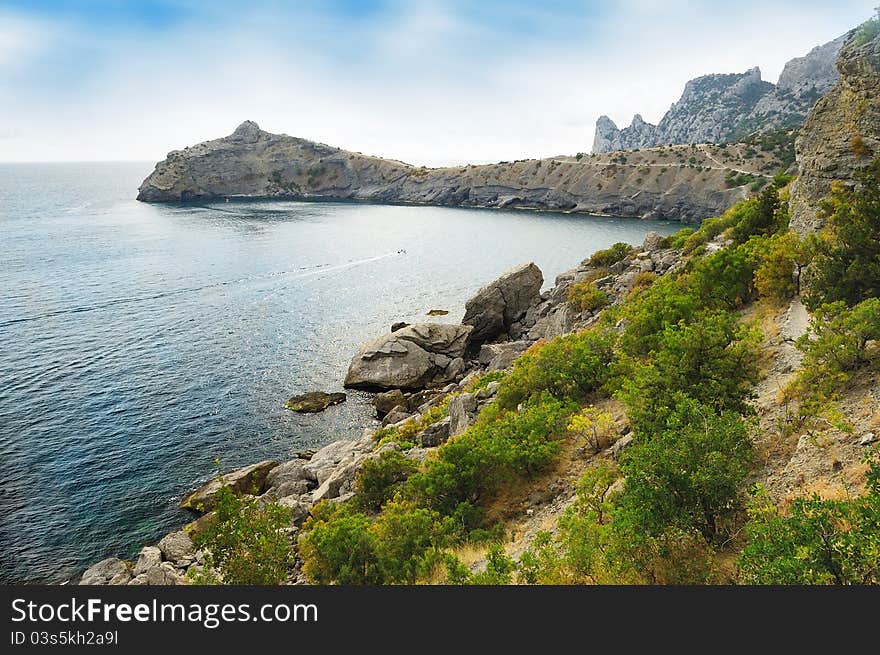 Sea Shore And Mountains