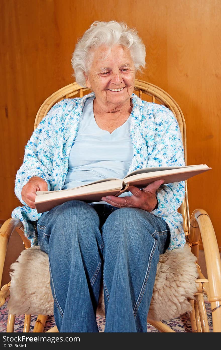 Portrait of a senior woman in rocking chair.