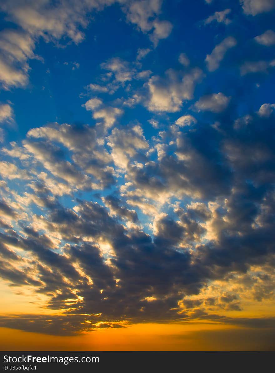 Bright Sunset And Clouds