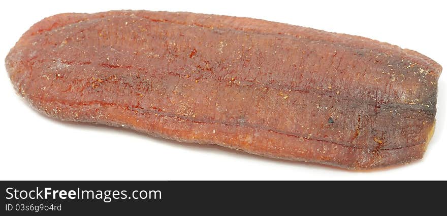 A dried banana on a white background