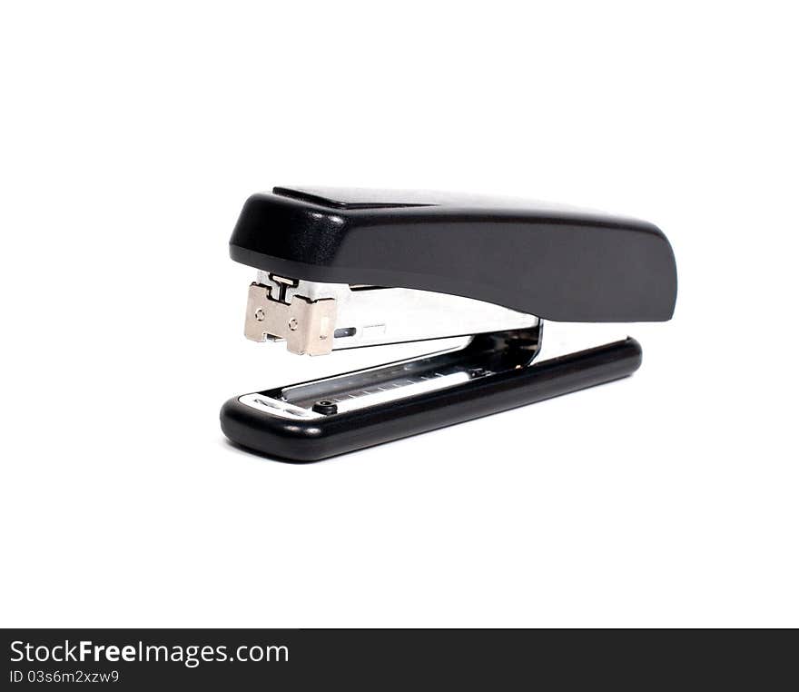 Black stepler on a white background. Black stepler on a white background