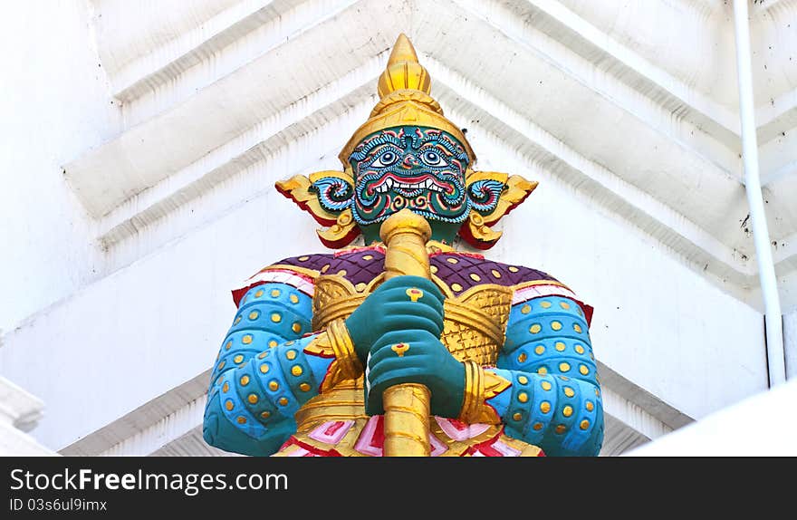 Giant guardians on base of pagoda, Thailand