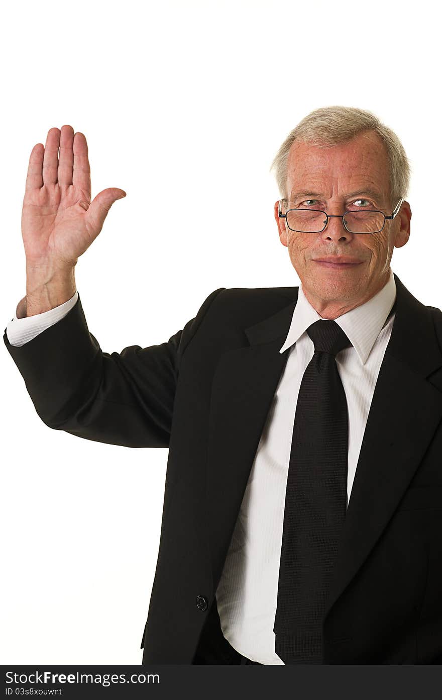 Business man in black suit doing the high five. Over a white background. Business man in black suit doing the high five. Over a white background