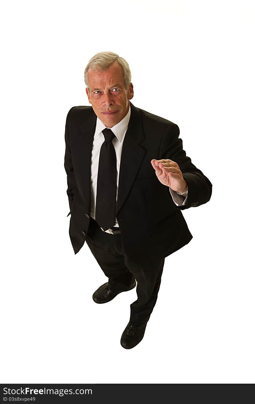 Business man in black suit over a white background