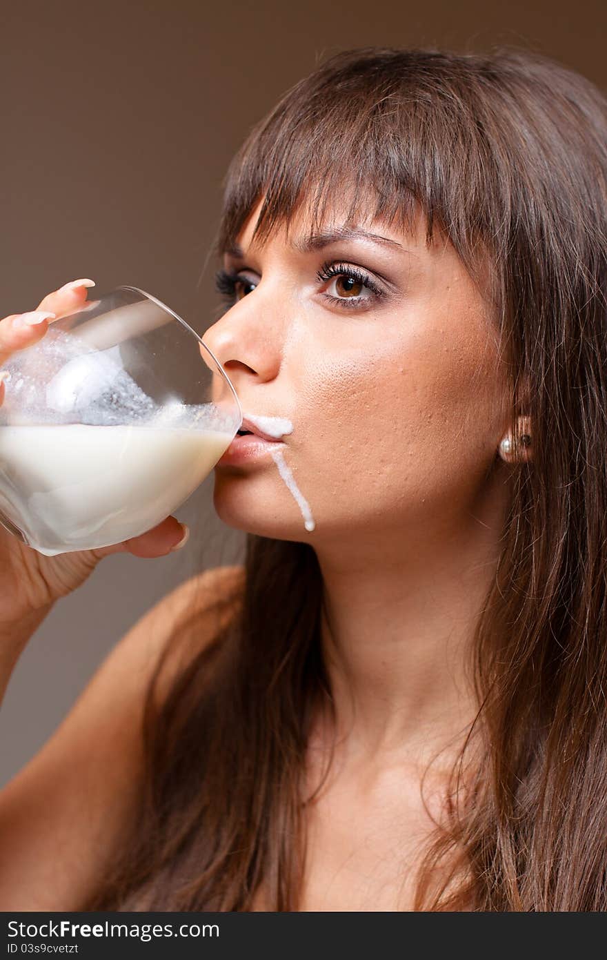 Portrait of beautiful woman drinking milk. Portrait of beautiful woman drinking milk