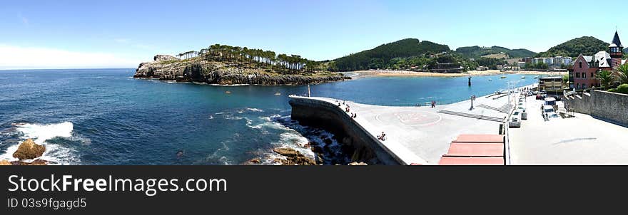 Panoramic view of the entrance of the beach on the Spanish coast in the north of Spain. Panoramic view of the entrance of the beach on the Spanish coast in the north of Spain