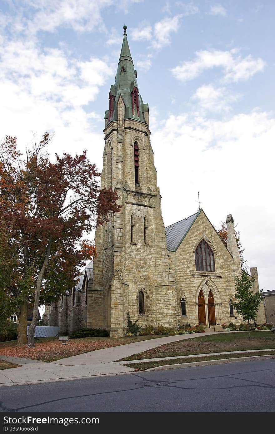 St. James the Apostle Anglican Church located in downtown Perth, Ontario was completed in 1861 and built from local sandstone. A fine example of Gothic Revival architecture, it features pointed-arch windows and an off-set tower and spire. It is listed with the Historic Places of Canada Registry. St. James the Apostle Anglican Church located in downtown Perth, Ontario was completed in 1861 and built from local sandstone. A fine example of Gothic Revival architecture, it features pointed-arch windows and an off-set tower and spire. It is listed with the Historic Places of Canada Registry.