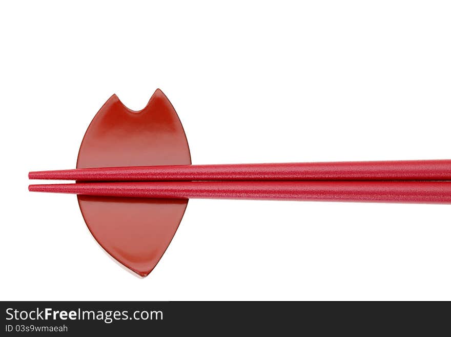 Chopstick and chopstick-rest isolated on a white background