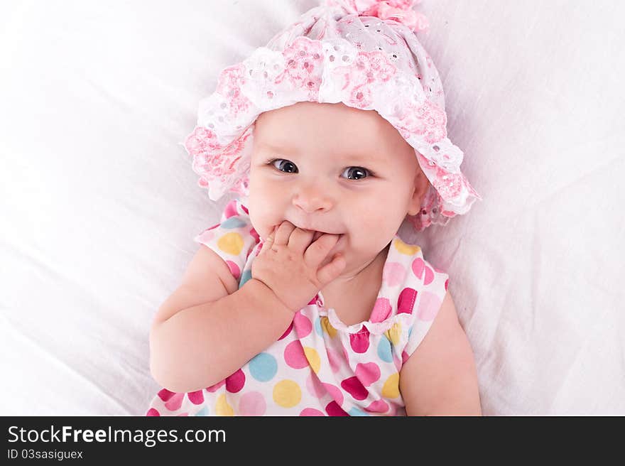 Portrait of a baby girl  on a white background