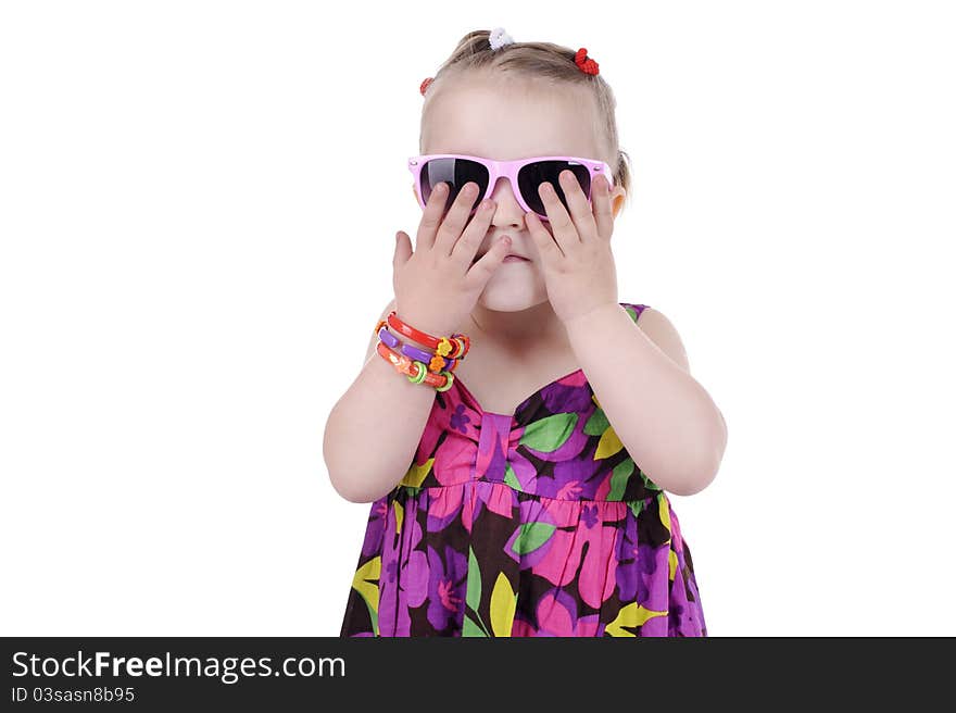 Portrait of a sweet little girl in sunglasses