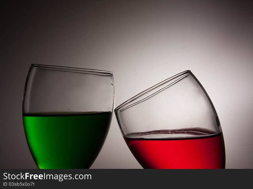 Photograph of two toasting glasses as a symbol of congratulating friends, partner, etc.