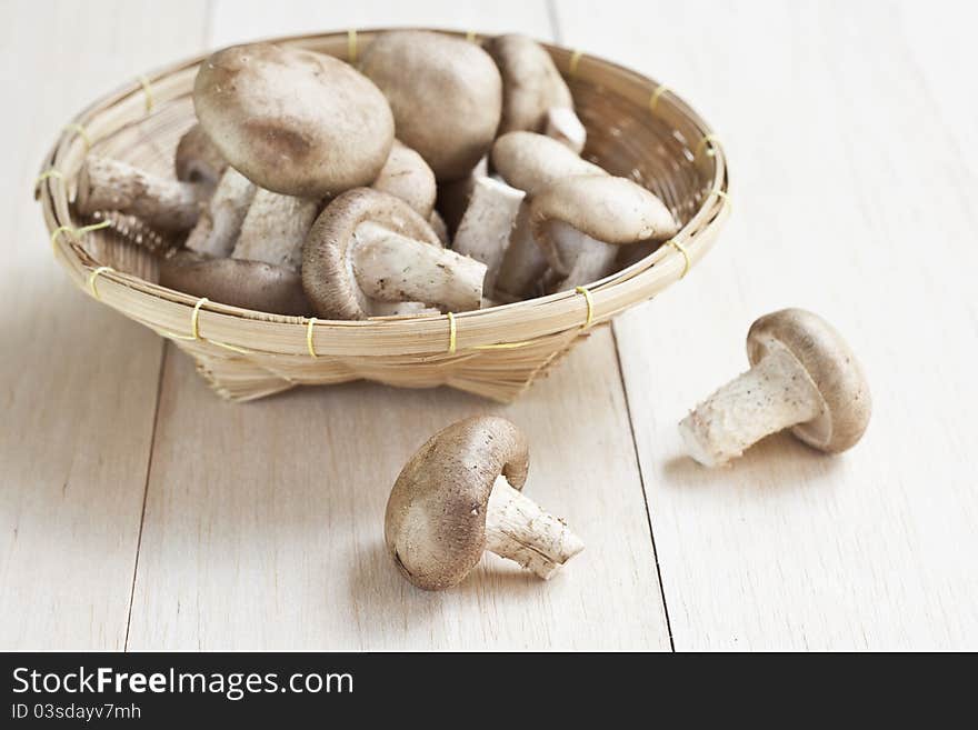 Fresh mushrooms on a wooden board