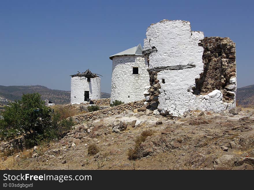 Old mills stand on a hill in Bodrum, Turkey. Old mills stand on a hill in Bodrum, Turkey