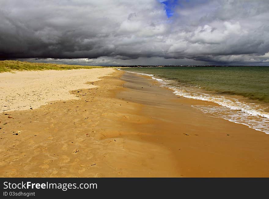 Studland Bay with threatening Storm Clouds over Poole Harbour, Dorset Coast, England. Studland Bay with threatening Storm Clouds over Poole Harbour, Dorset Coast, England