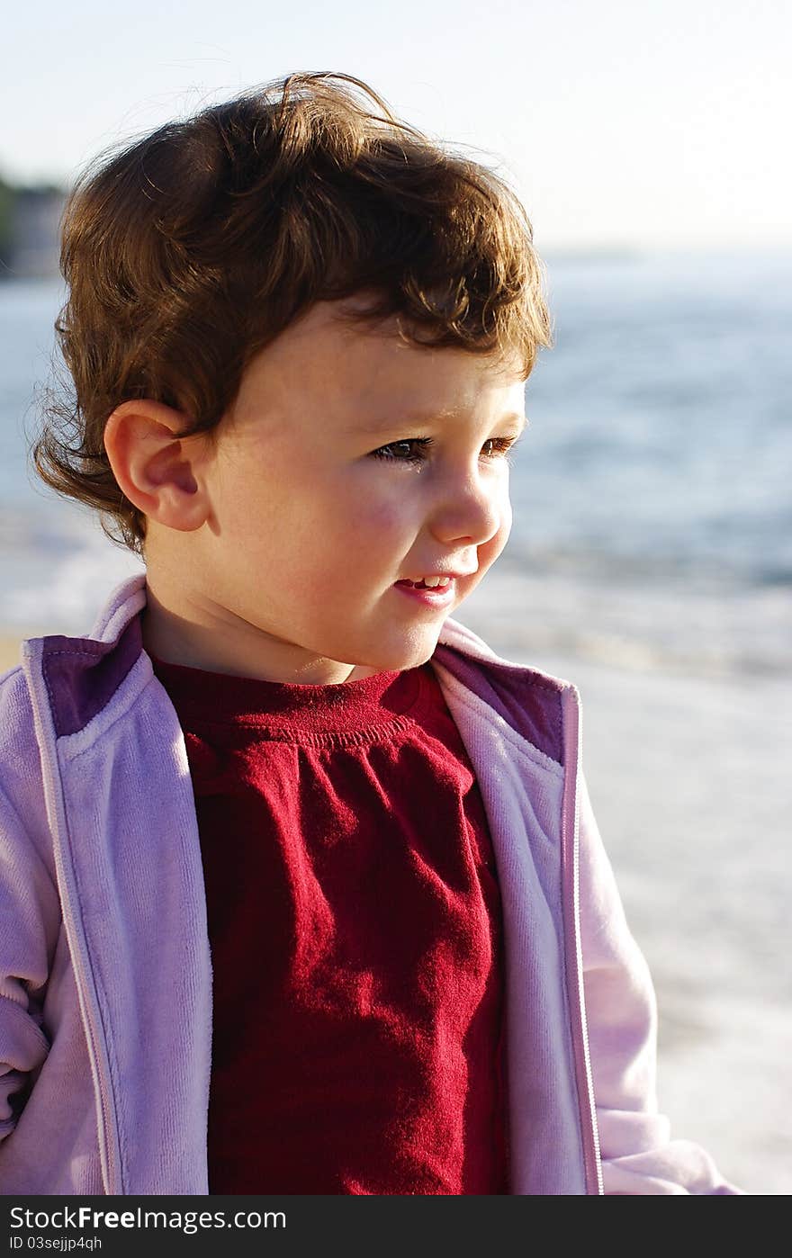 Child first time on the beach