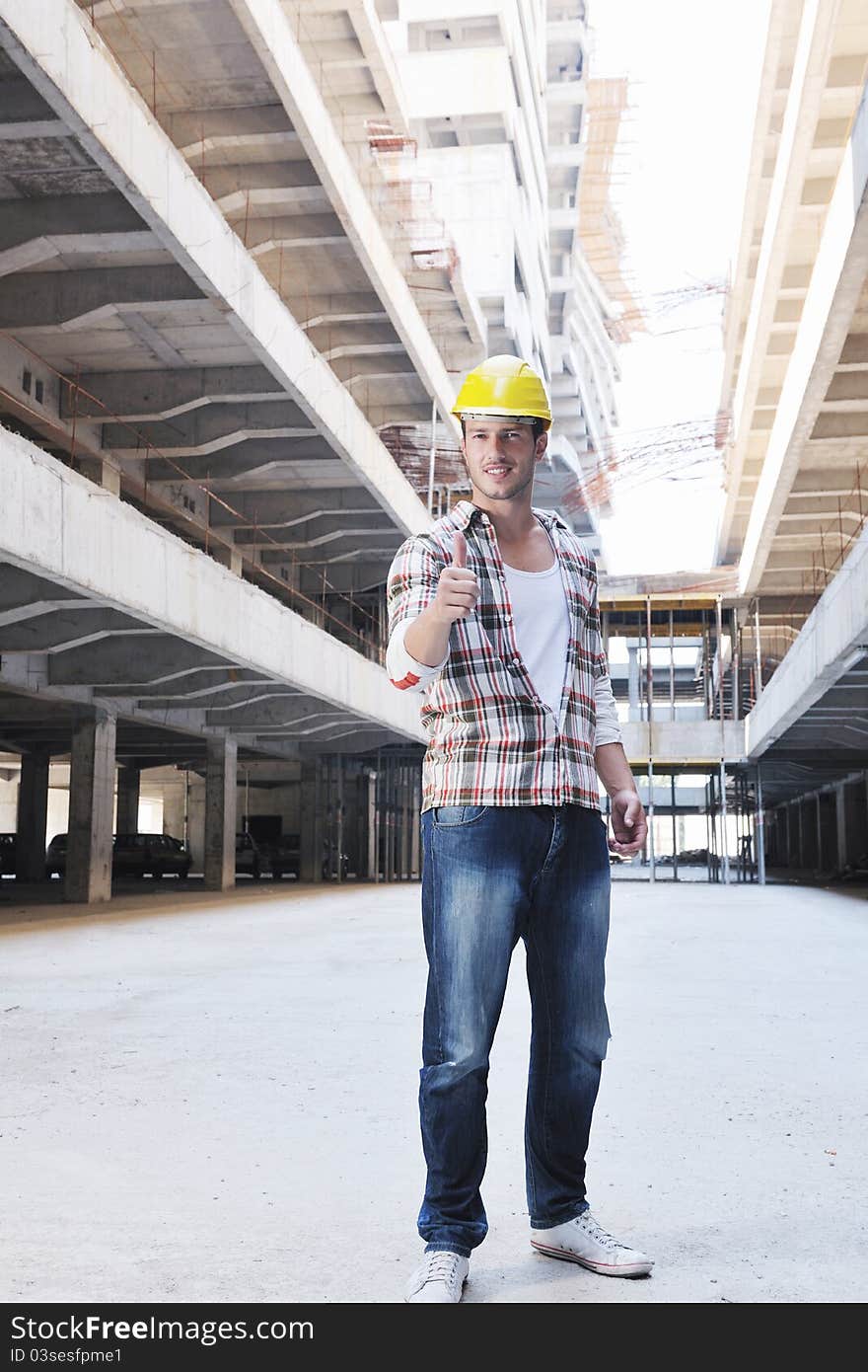 Handsome hard worker people portrait at concstruction site. Handsome hard worker people portrait at concstruction site