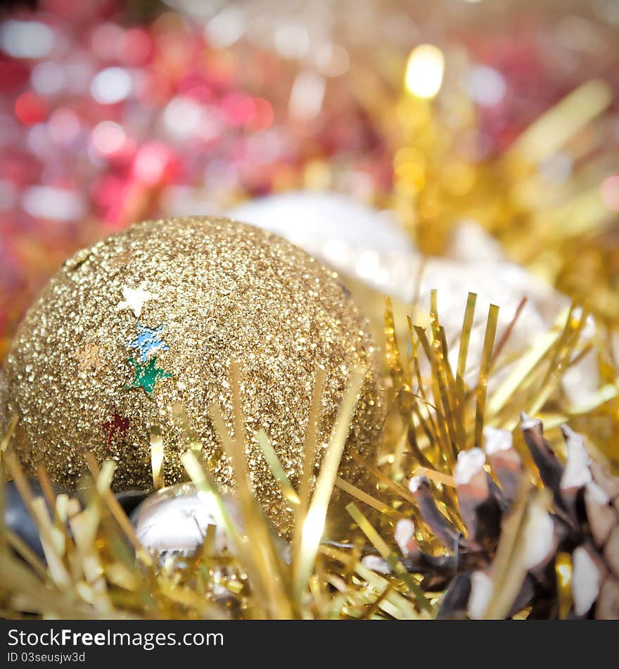 Christmas decoration with shiny glare over light background