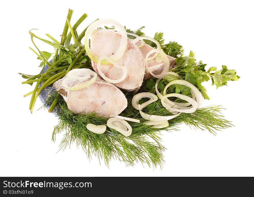 Pieces of white fish on a plate