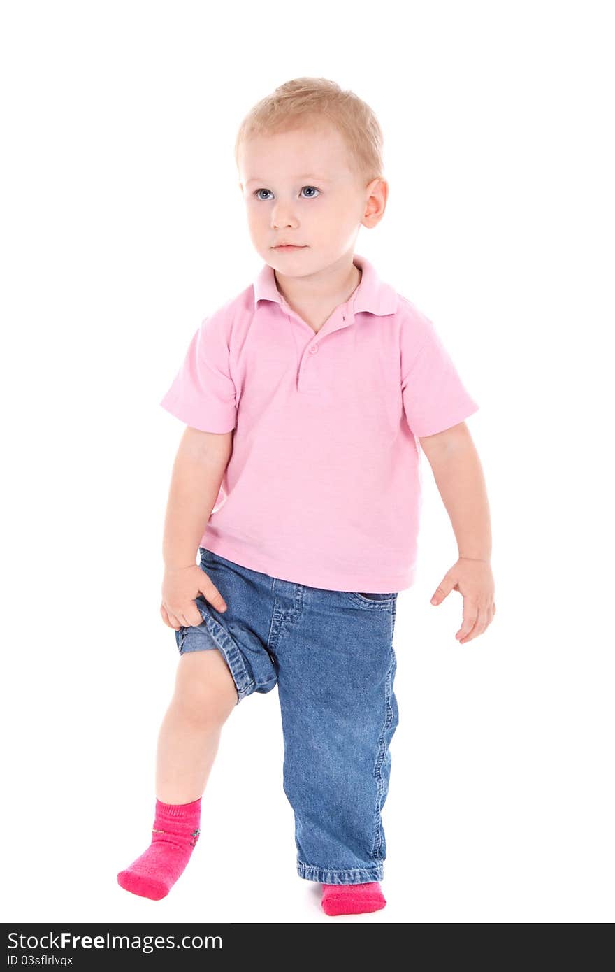 Adorable 2 year old boy looking up over white background. Adorable 2 year old boy looking up over white background