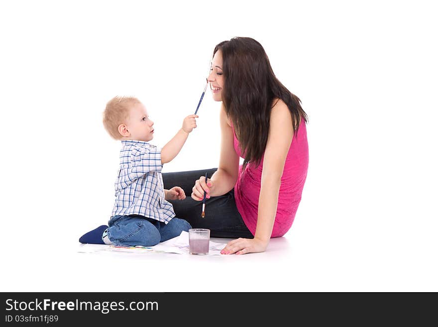 Child paint on mother face isolated over white background. Child paint on mother face isolated over white background