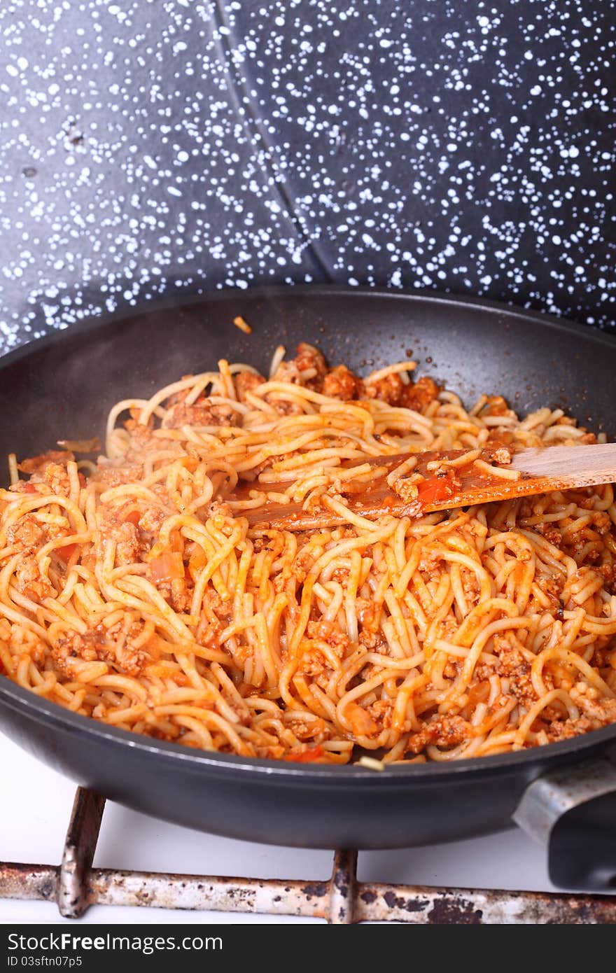 Boiling Spaghetti, frying pan, Pasta in a skillet. Boiling Spaghetti, frying pan, Pasta in a skillet