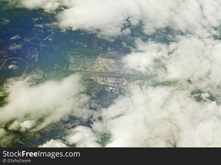 A photo of world seen from above through the clouds. A photo of world seen from above through the clouds