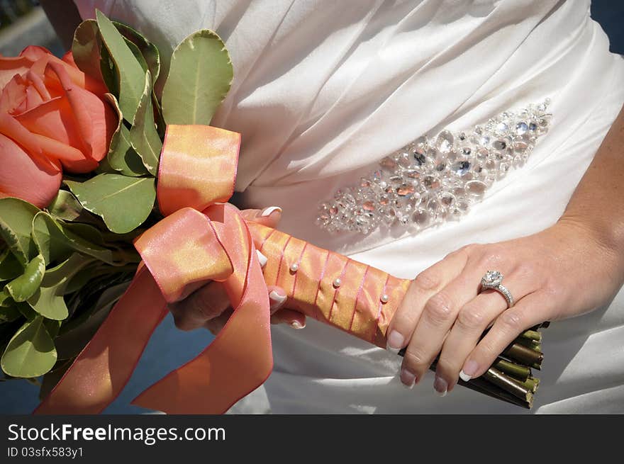 Closeup Of Bride Holding Bouquet