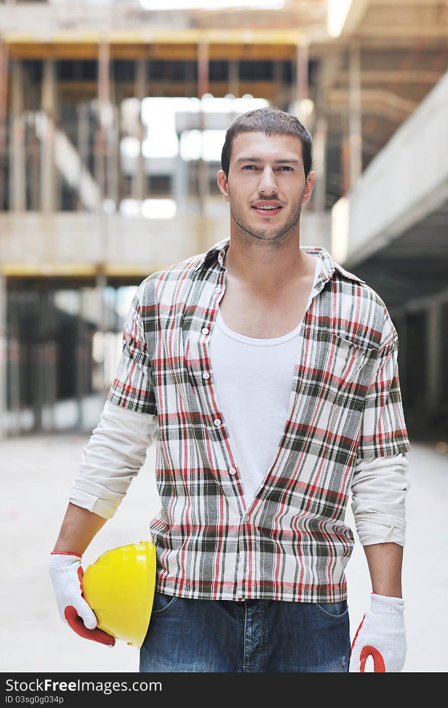 Handsome hard worker people portrait at concstruction site. Handsome hard worker people portrait at concstruction site