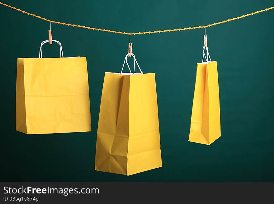 Shopping Yellow Gift Bags On Green