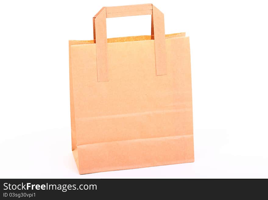 Shopping brown gift bags isolated