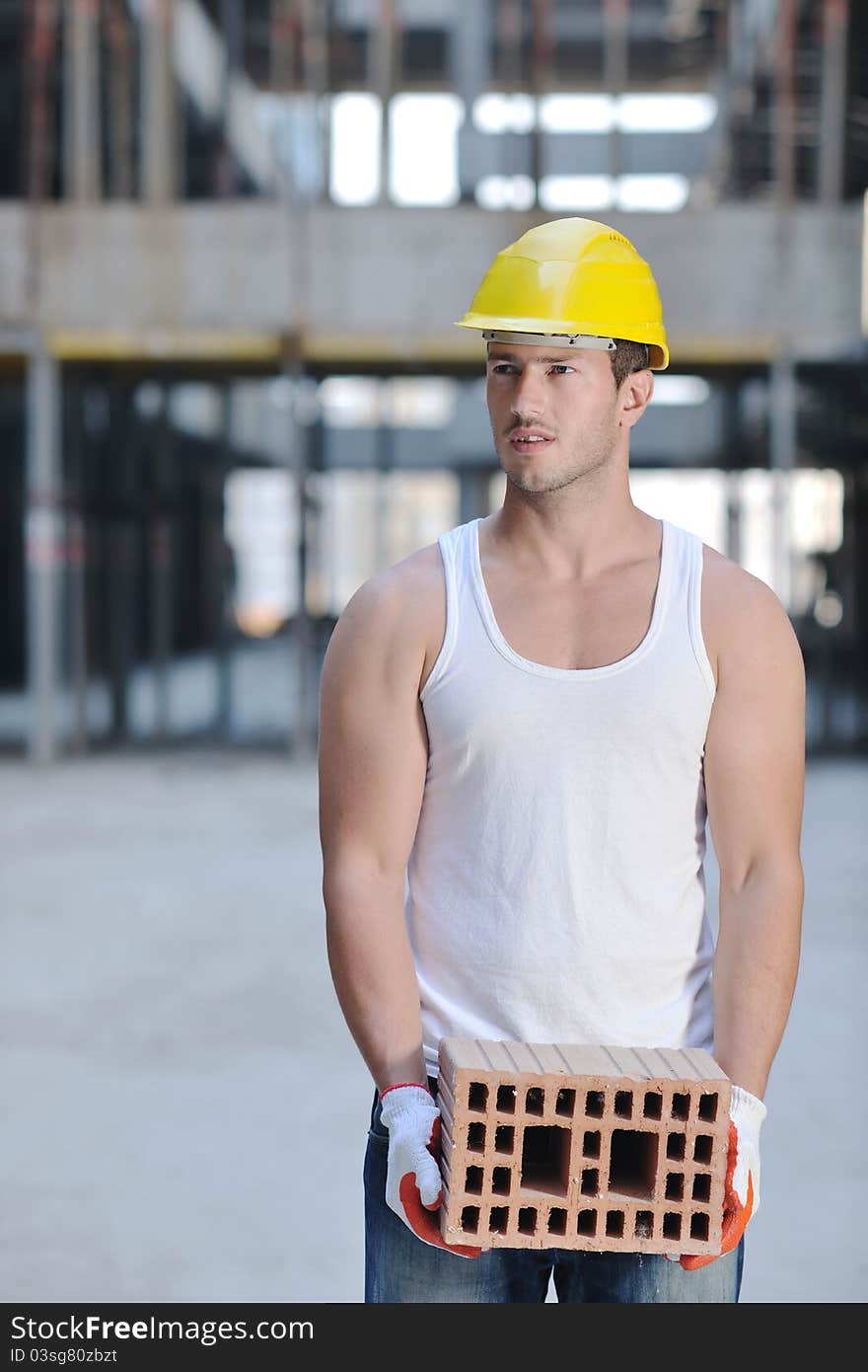 Handsome hard worker people portrait at concstruction site. Handsome hard worker people portrait at concstruction site