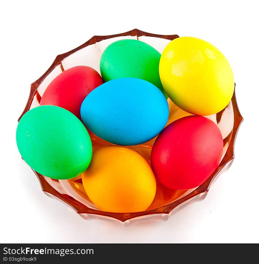 Many different color eggs over white background. Food