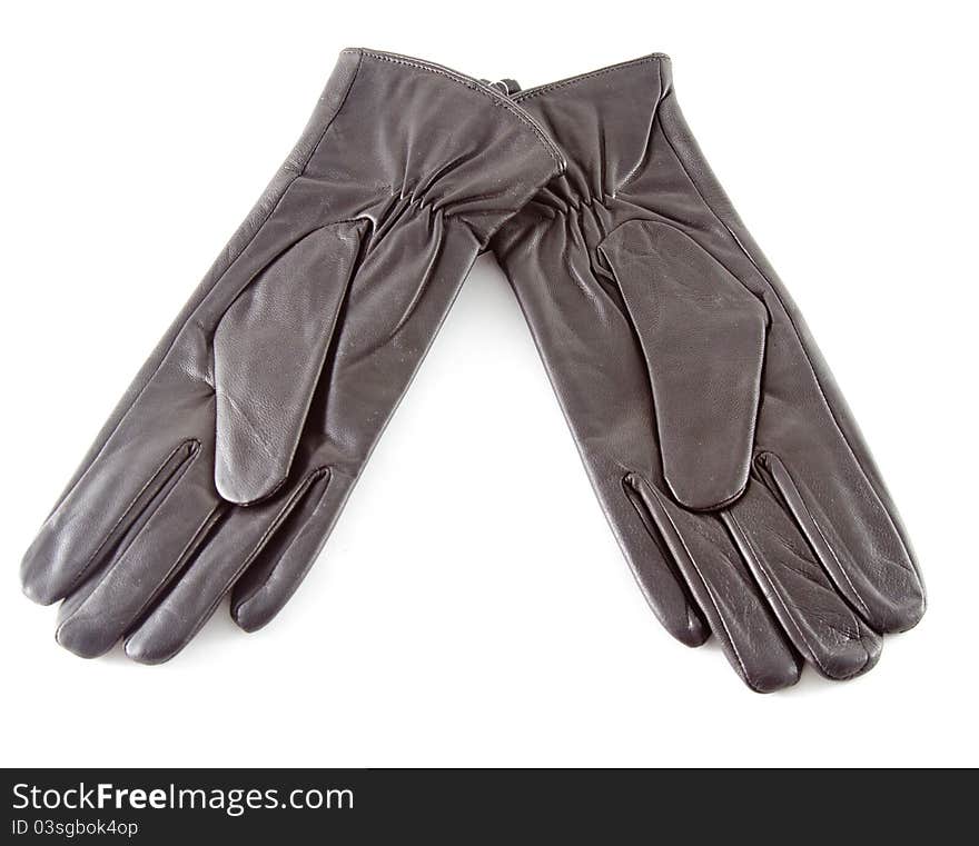 Two black leather gloves ower white background