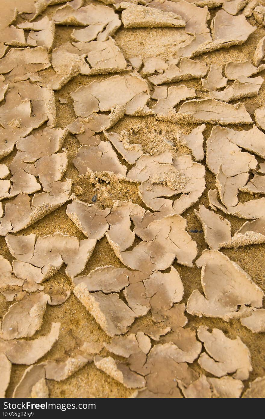 Texture of cracked and peeling sand soil. Texture of cracked and peeling sand soil.