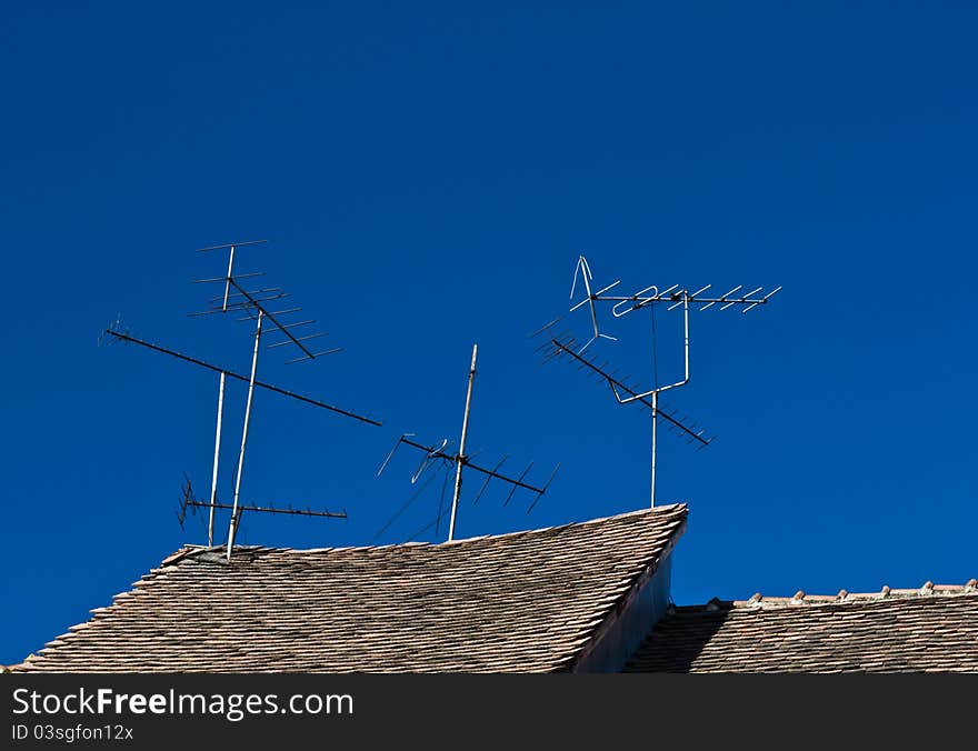 Antennas on an old roof. Antennas on an old roof